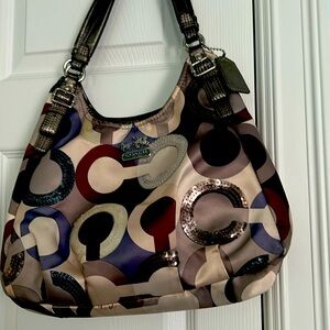 Coach purse used few times. In a new condition